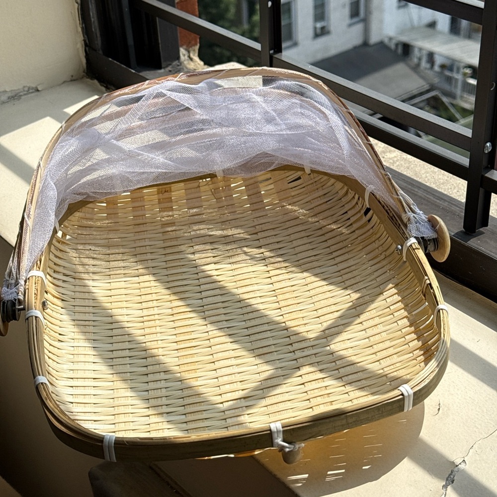 Woven Basket with White Mesh Cover
